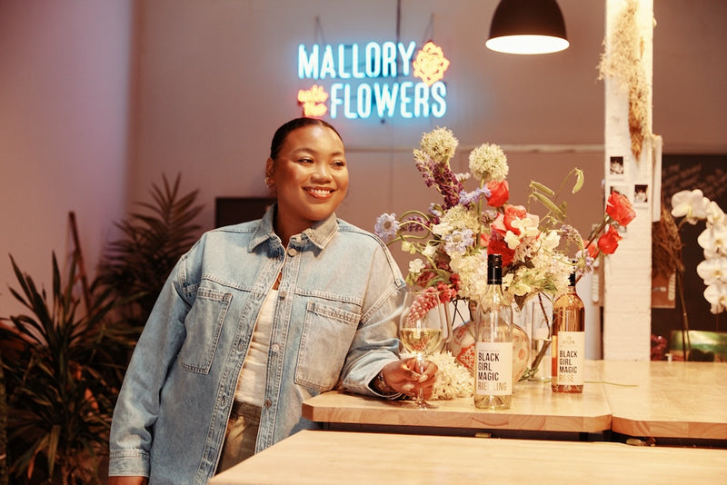 Magic Maker: Mallory with the Flowers – Embodying the Essence of Black Girl Magic through Floral Artistry