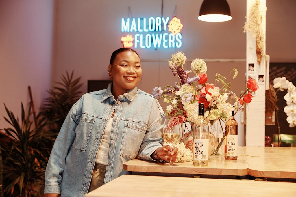 Magic Maker: Mallory with the Flowers – Embodying the Essence of Black Girl Magic through Floral Artistry
