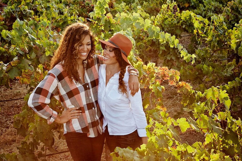 The McBride Sisters: "Meet the Two Sisters Making Wine More Accessible for Black Wine Drinkers" on Thrillist