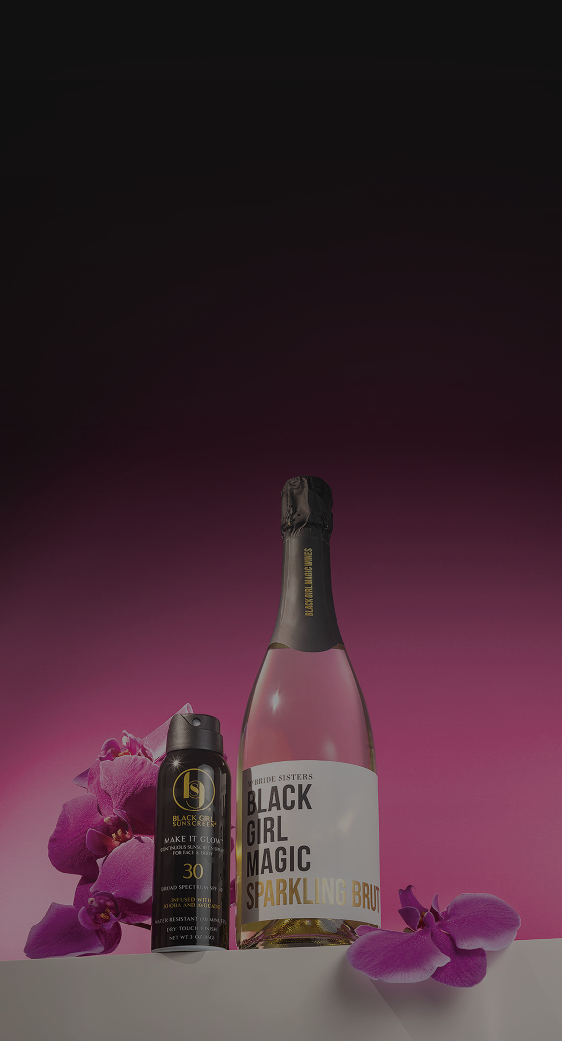 Bottle of Black Girl Magic Brut with Black Girl Sunscreen

