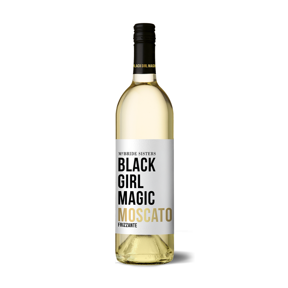 A bottle of Black Girl Magic Moscato Frizzante wine with a white label featuring black and gold text, set against a plain white background.